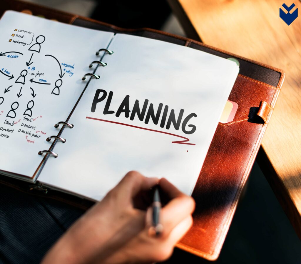 woman writing planning business strategy